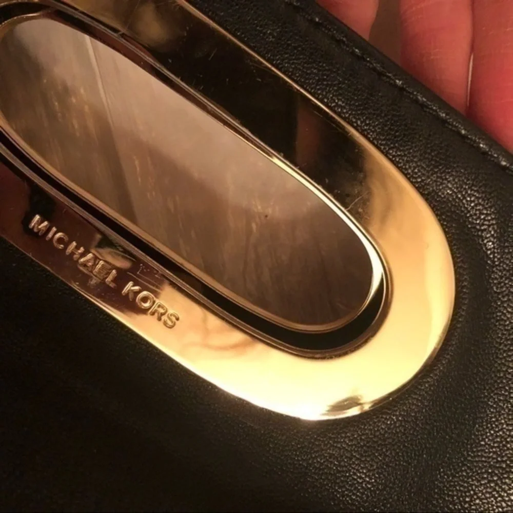 Michael kors black leather clutch bag